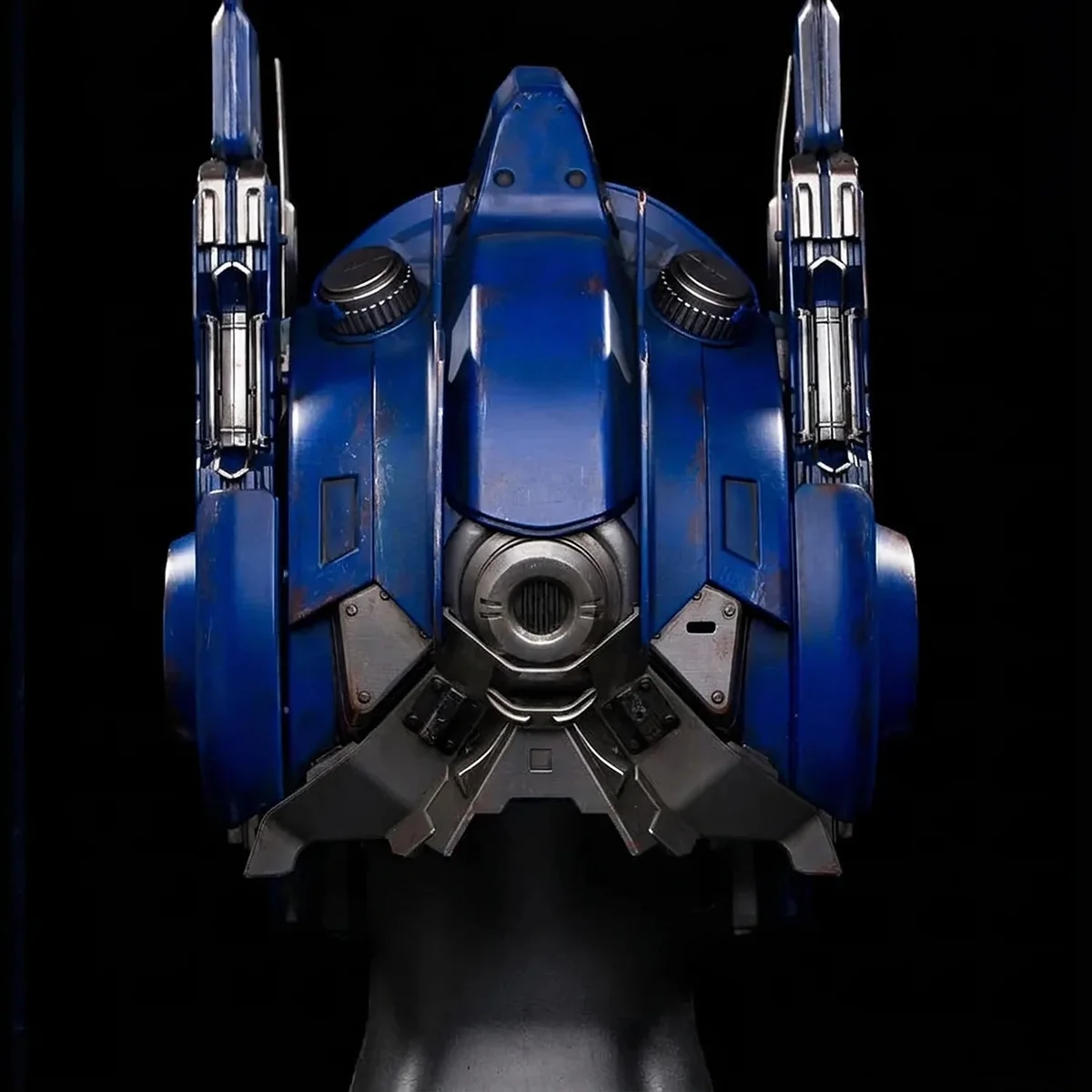 Back of the Optimus Prime helmet on a display head, showing how it sits over the head