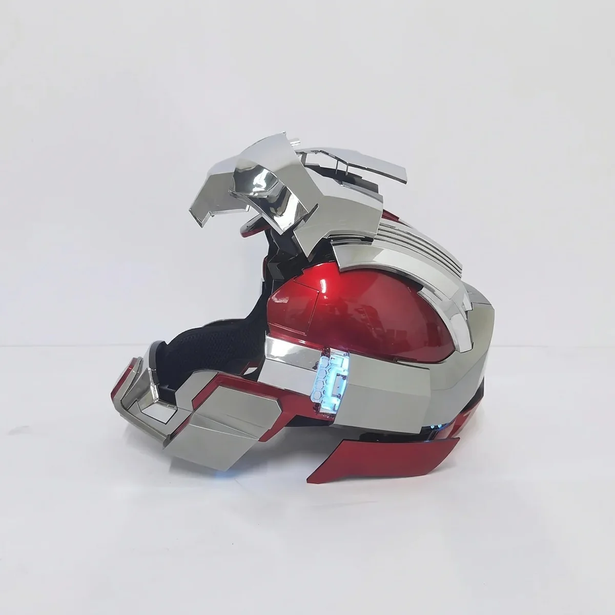 MK17 Heartbreaker open in side view, faceplate lifted over the crown and jaw swung down