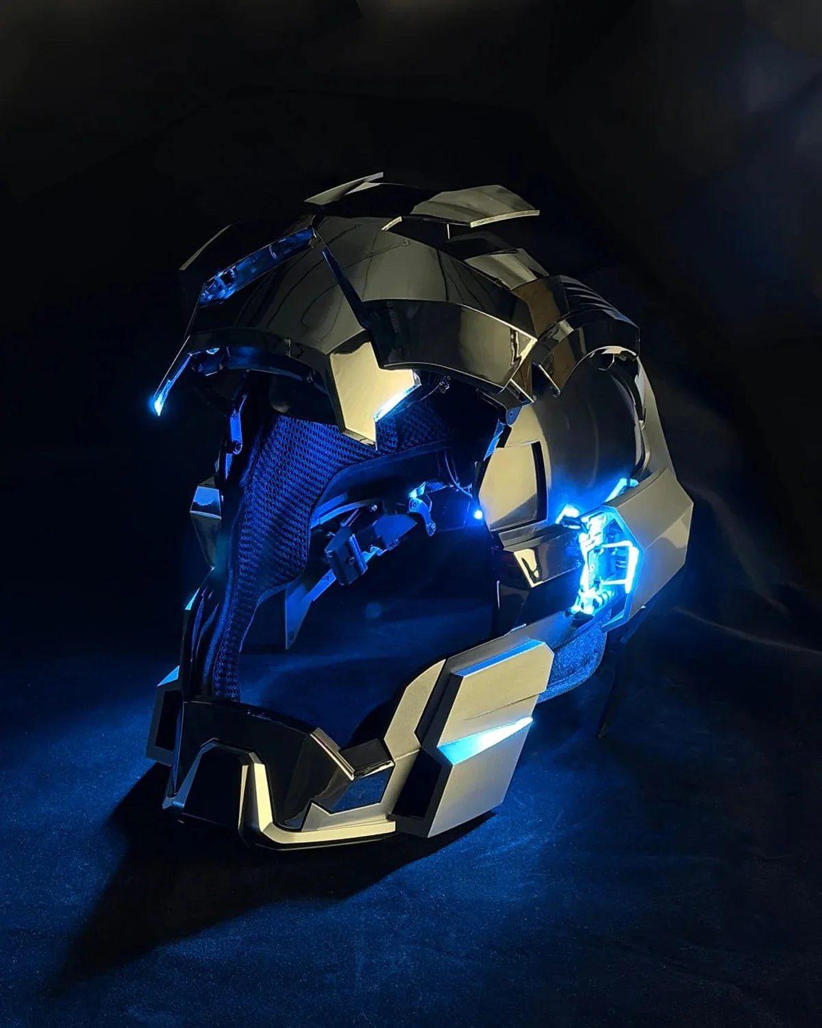 Inside the open MK17 helmet: blue mesh lining under the raised faceplate
